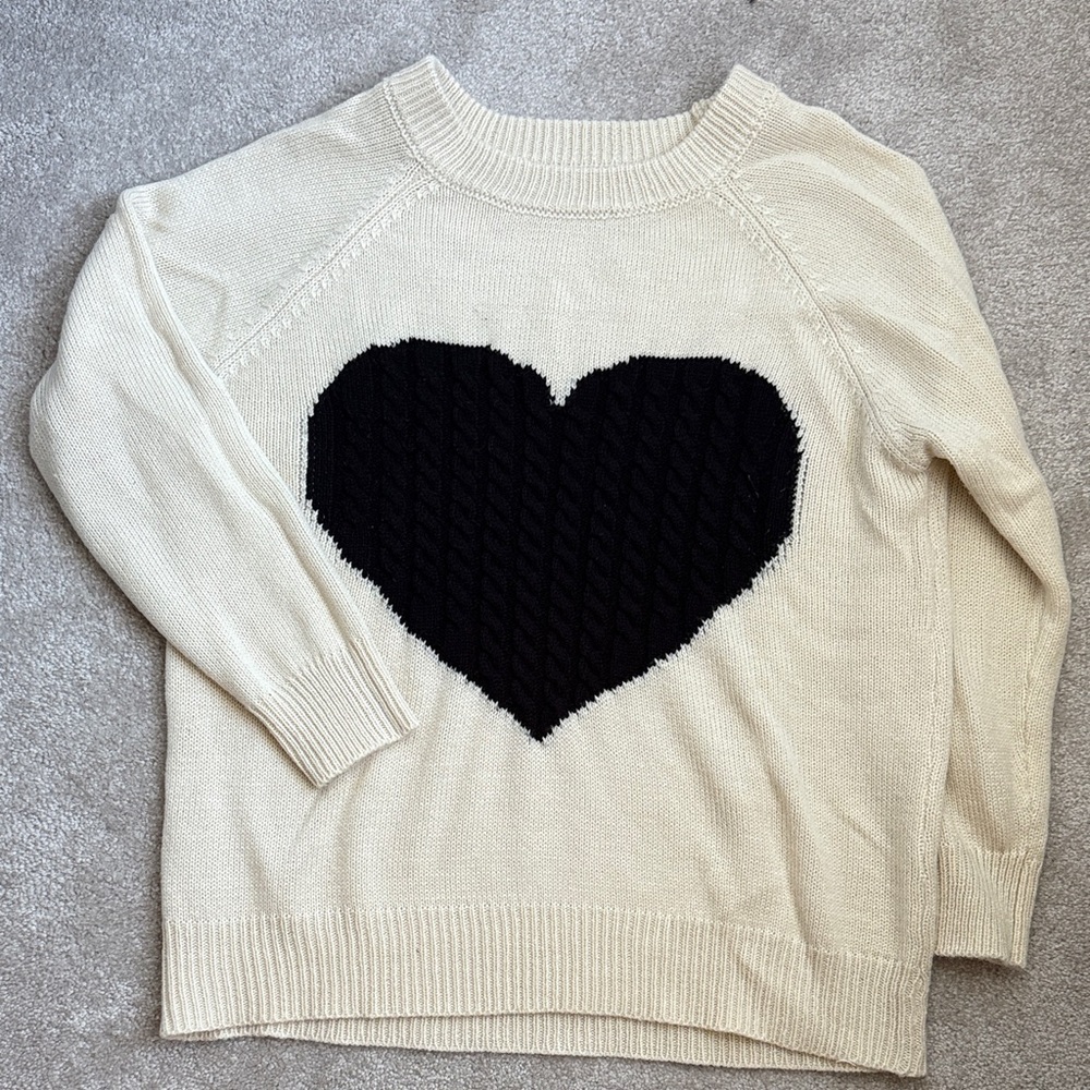 Cozy Cream Sweater with Black Heart Design